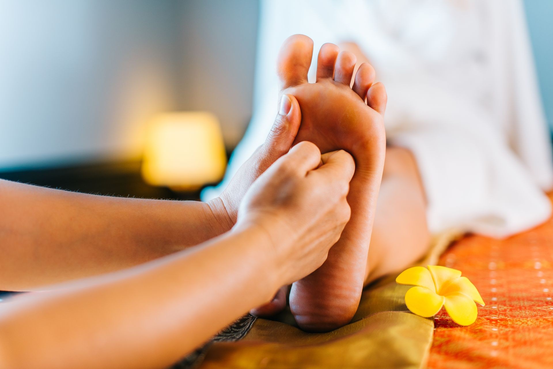Woman Feet Massage in Thai Massage Saloon